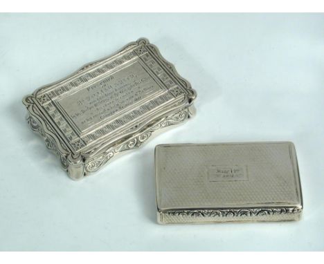 A Victorian silver snuff box, Birmingham 1864, of shaped rectangular form with gilt interior, the cover inscribed 'Presented 