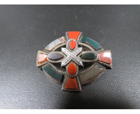 A Celtic hardstone Scottish type brooch set in white metal