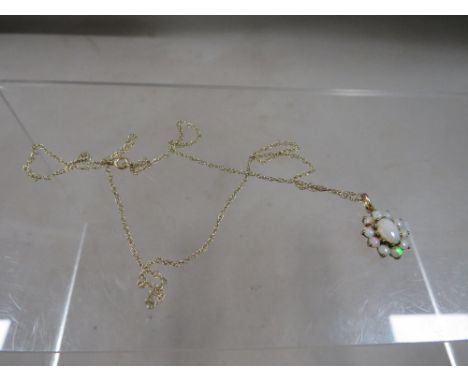 A vintage 9ct gold opal pendant necklace