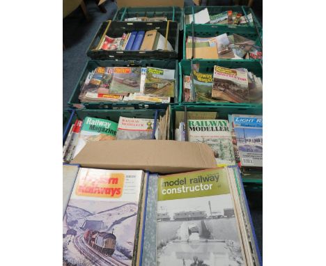 A large quantity in several trays of railway and model railway magazines etc (trays not included)