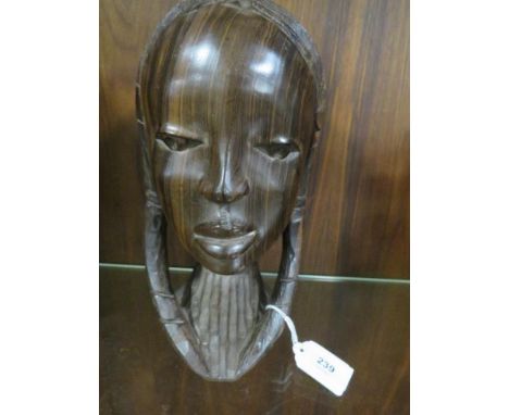 A vintage ironwood female African head study