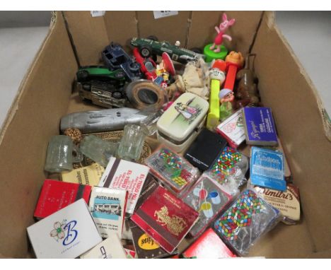 A collection of vintage toys and collectables to include Dinky, Disney, Pez etc, plus a selection of new old stock vintage Ru