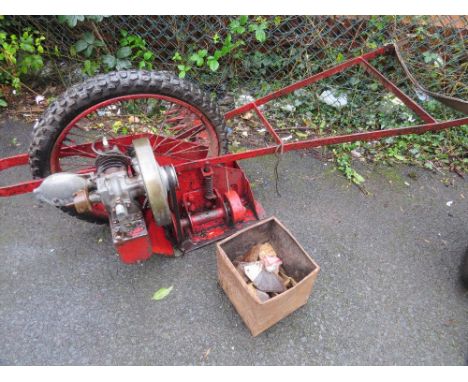 A petrol push along Allen scythe with a Villiers engine (vintage) plus a box of spare blades