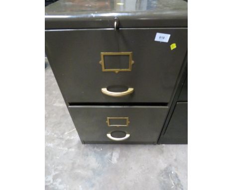 A vintage green 2 drawer filing cabinet