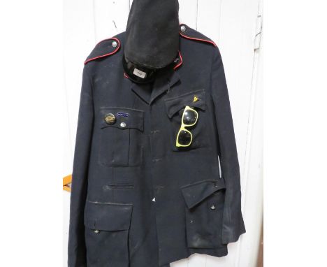 A vintage conductors uniform together with ties, badges, hat etc