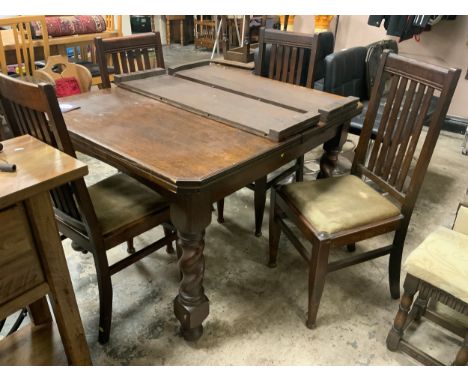An oak vintage barleytwist wind-out dining table with four oak chairs - Handle