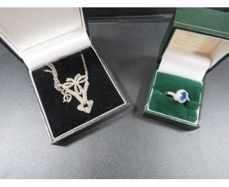 A vintage silver marcasite necklace together with a silver ring