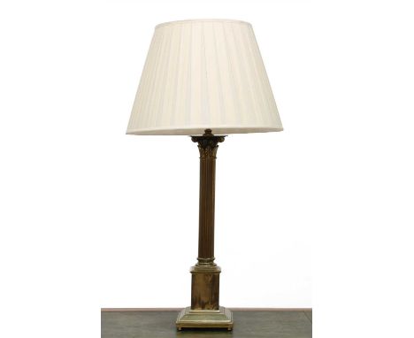 A large brass Corinthian column table lamp, 20th century, on a square stepped base, with silk shade, 94cm high overall