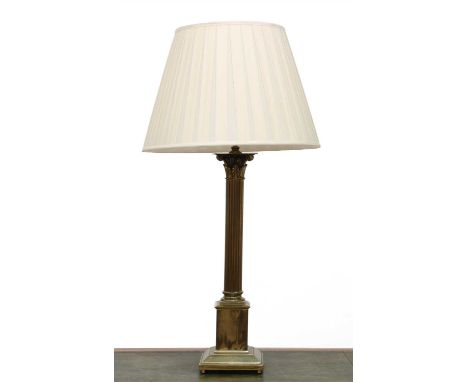 A large brass Corinthian column table lamp, 20th century, on a square stepped base, with silk shade, 94cm high overall