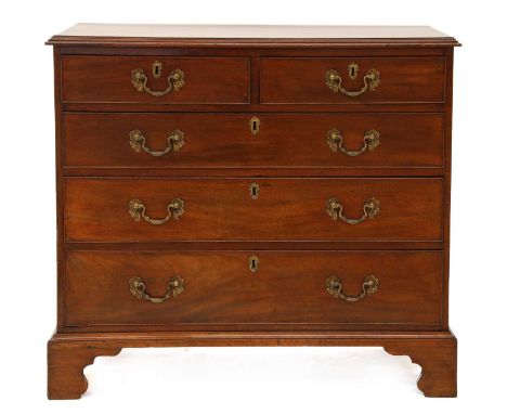 A George III mahogany chest, of two short and three long graduated drawers, on bracket feet, 94.5cm wide 52.5cm deep 86cm hig