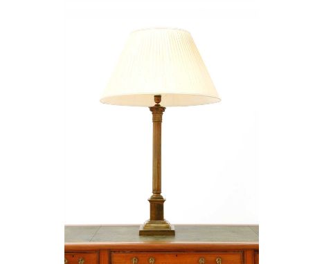 A brass Corinthian column table lamp, with a stepped square base and silk shade, 93cm high