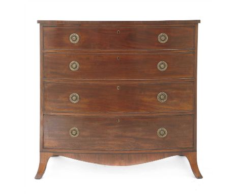 A bow front mahogany chest of drawers, 19th century, having four long drawers with brass ring handles, on splayed bracket fee