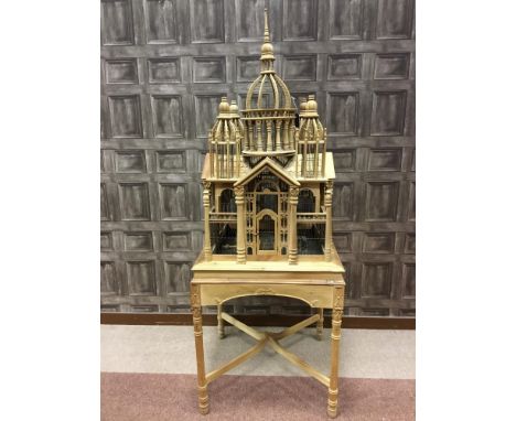 LARGE INDIAN LIGHTWOOD BIRD CAGE, of architectural form, on detachable stand, 193cm high overall