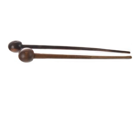 TWO AFRICAN HARDWOOD KNOBKERRIE, of typical form, the longest 85cm