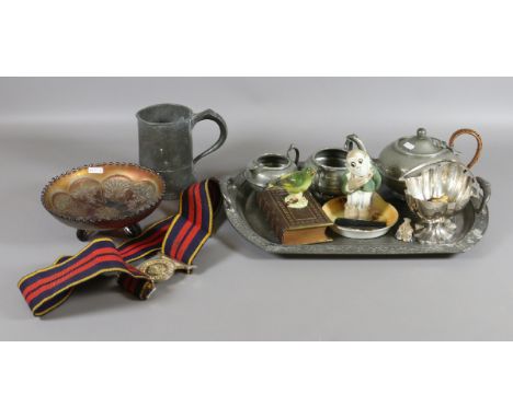 A collection of metalwares and ceramics to include pewter three piece teaset, Noritake, silver plate, stable belt, Wade, etc.