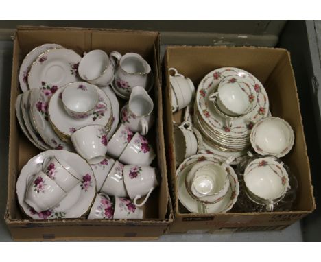 A Czechoslovakian part tea service decorated with gilt and flowers, along with a Victorian china part tea service also decora