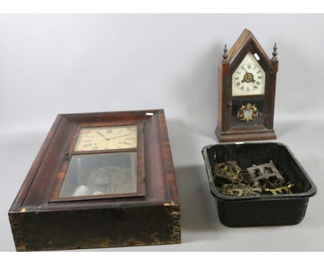 American twin weight wall clock along with a similar mantel clock and several movements.