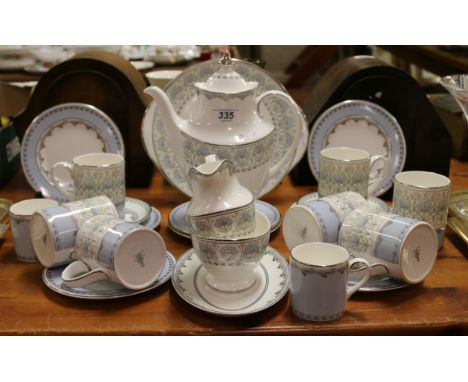 A Royal Doulton china tea service decorated with floral pattern (approximately twenty four pieces).