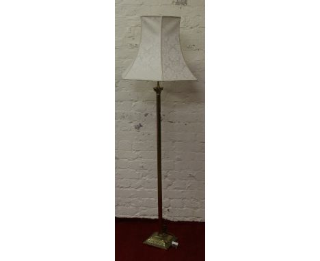 A good quality column standard lamp and shade.
