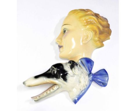 Goebel ceramic glazed wall mask, modelled as a lady with strawberry blonde hair with a hound wearing a blue bow, impressed ma