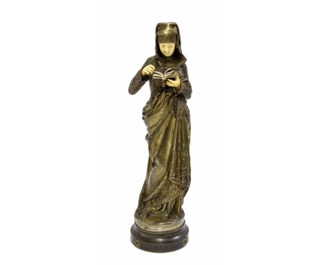 Albert Carrier Belleuse (1824-1887) - 'Liseuse', gilded bronze and ivory figure of a lady, signed to the base, mounted upon a