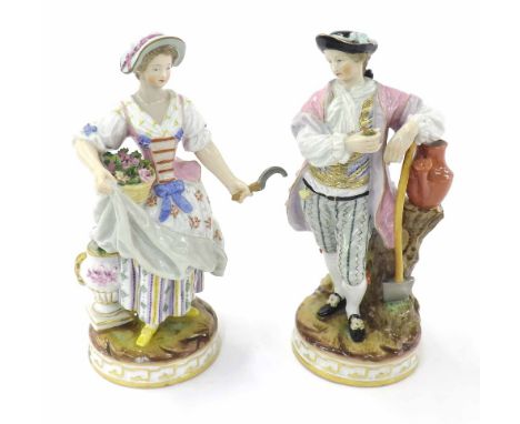 Pair of Meissen porcelain figures, modelled as a lady and gentleman both with gardening tools upon naturalistic scenes, circu