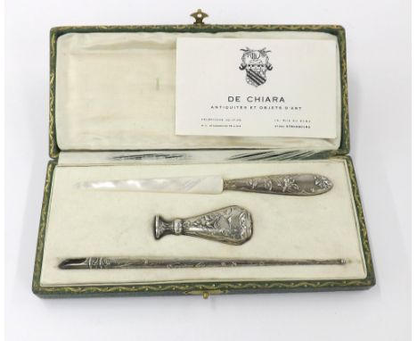 Continental Art Nouveau silver desk set, comprising mother of pearl blade letter knife, wax seal and ink quill holder, within