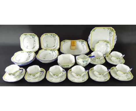 Shelley 'Balloon Tree' Queen Anne tea service, pattern 11624, comprising eight cups and nine saucers, seven side plates, sand