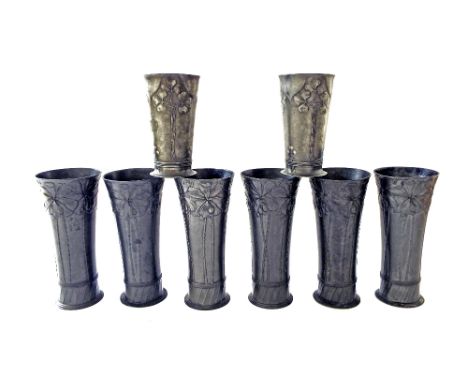 Orivit - matched set of six Art Nouveau pewter beakers, no. 2165, with embossed palm tree decoration, 7.25" high, together wi
