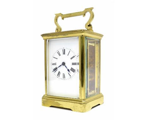 Brass cased carriage clock timepiece, 7" high including handle (with winding key)
