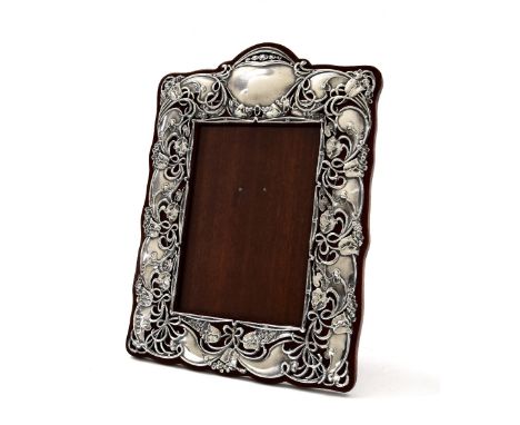 Art Nouveau silver photograph frame, with a stylised foliate surround on a replaced mahogany back board, Birmingham 1907, mak