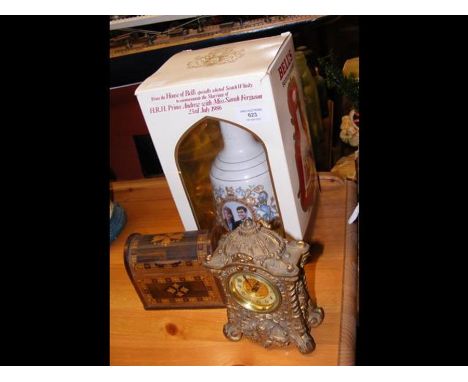 A commemorative Bell's Scotch Whisky in box, together with French style carriage clock and a playing card box 