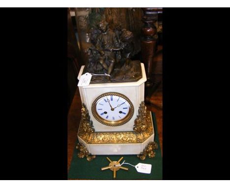 A decorative antique French mantel clock with figural group to the top and gilt mounts - 40cm high 
