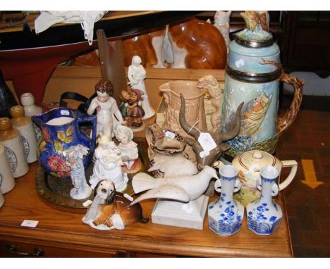 A medley of collectable china, including Hummel figure and Royal Doulton teapot 