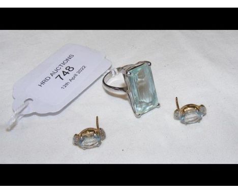 An aquamarine ring, together with a pair of stud earringsCONDITION REPORTRegarding the ring: Band size approx. Q/R. No visibl