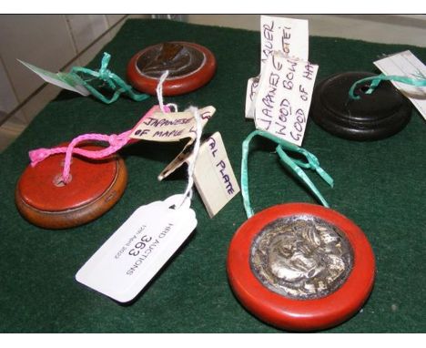 A Japanese Kagamibuta Netsuke together with three othersCONDITION REPORTWe have attached a number of additional images to sho