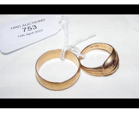 A 9ct wedding band together with a ruby mounted 9ct 'snake' ring