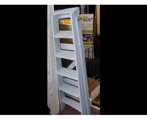 A vintage painted wooden stepladder 