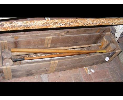 A vintage croquet set in wooden crate 