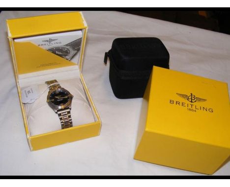 A gentleman's Breitling Aerospace wrist watch - original box and paperwork 