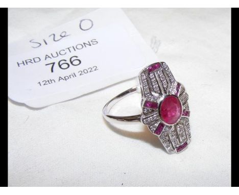 An Art Deco style 9ct white gold ruby and diamond ring