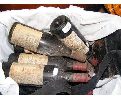 A vintage 1986 red wine with others CONDITION REPORTWe have attached a number of additional images to showcase the lot in fur