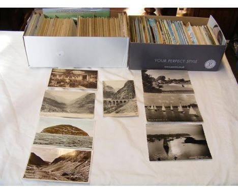 Two boxes of collectable vintage postcards