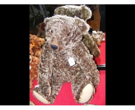 A large Steiff collectable teddy bear with button to ear - 55cms