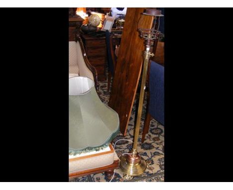 A Victorian adjustable brass and copper standard lamp