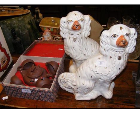 A pair of Staffordshire mantel dogs, together with a Yixin Chinese teapot and cups 