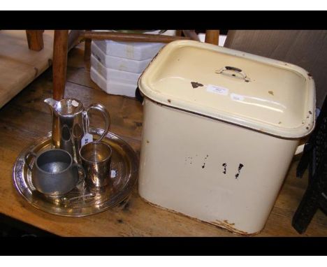 An enamel bread bin, silver beaker, Middle Eastern inlaid tray etc.