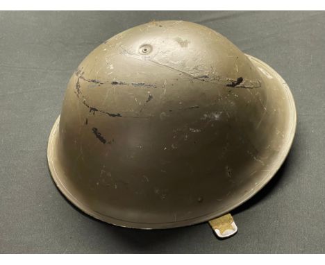 British MKIV Steel Helmet. Complete with liner and chinstrap. Dated 1952. Size 7 1/2.