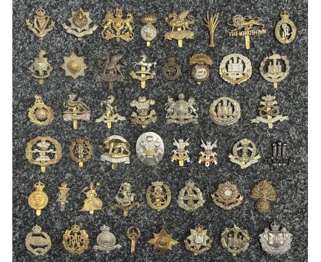 Collection of British Army Cap badges to include: General Service Corps: Royal Signals: The Buffs: Welsh Guards: Royal Welch 