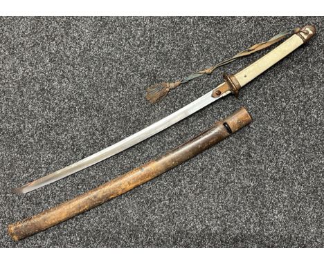 WW2 Japanese Shin Gunto Officers Sword with single edged blade 640mm in length. Hamon line visible. Signed tang. Ito braid an